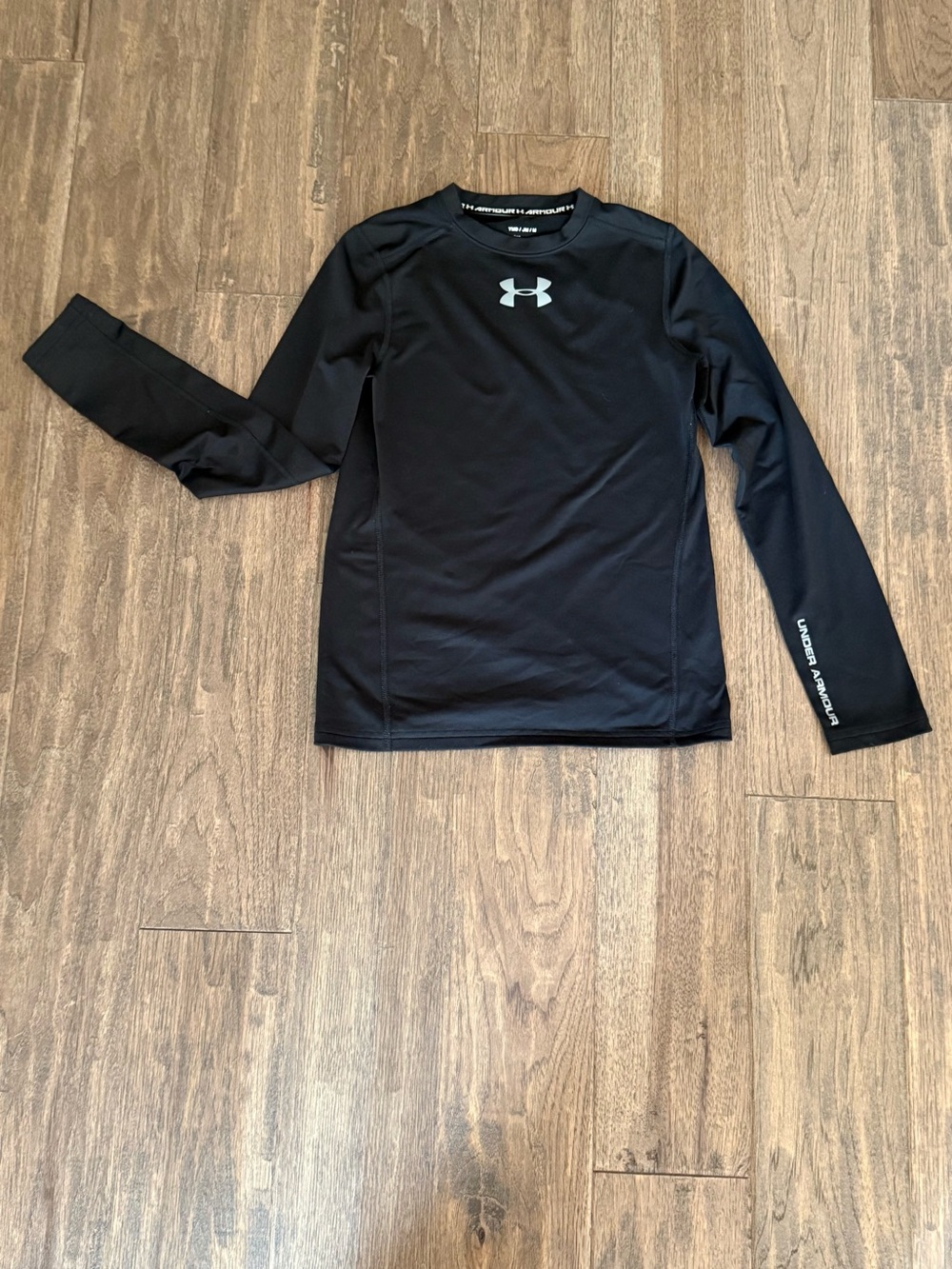 Girls size medium (10/12) Under Armour black fleece lined base layer